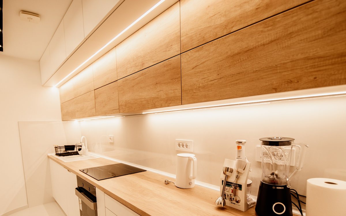 Minimal built-in kitchen with flush-mounted appliances, of the kind we repair in Walnut Creek homes