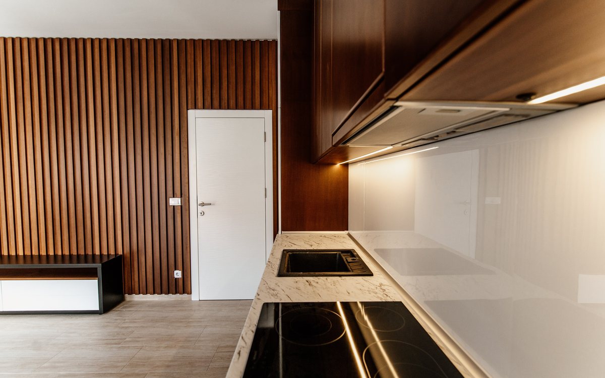 Modern kitchen with built-in appliances of the kind we repair in Walnut Creek homes
