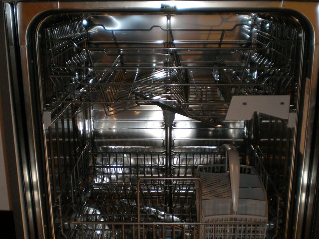 Integrated dishwasher interior after a drain pump replacement