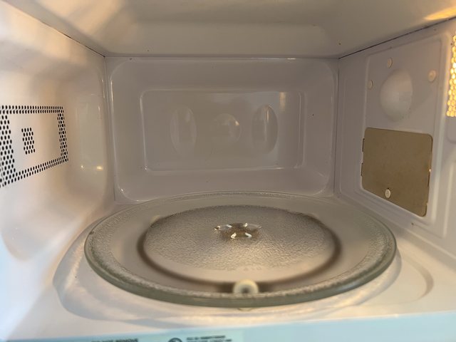 Built-in microwave interior after a door latch repair
